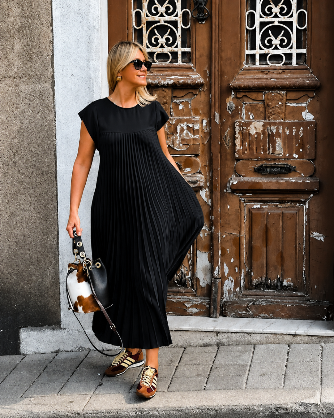 Vestido longo elegante com pregas finas
