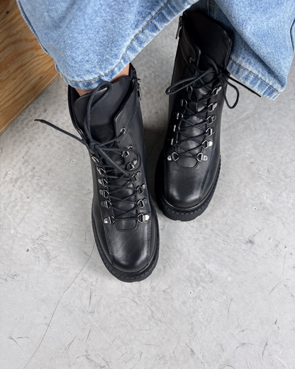 Botas com salto alto