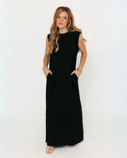 Vestido comprido e solto com bolsos laterais